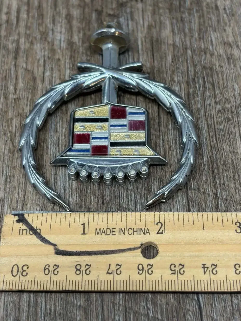 Vintage Iconic GM Cadillac crest and wreath hood ornament emblem with gold birds
